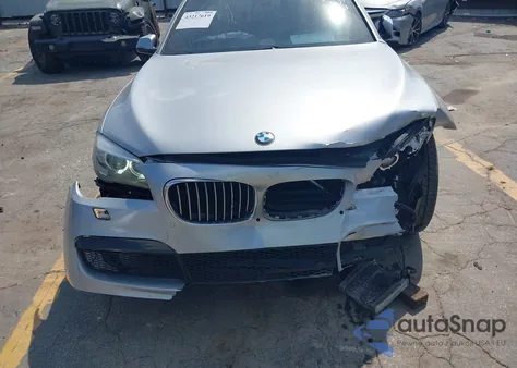 2014 BMW 740Li из США, поврежденный, VIN WBAYE4C58ED138126